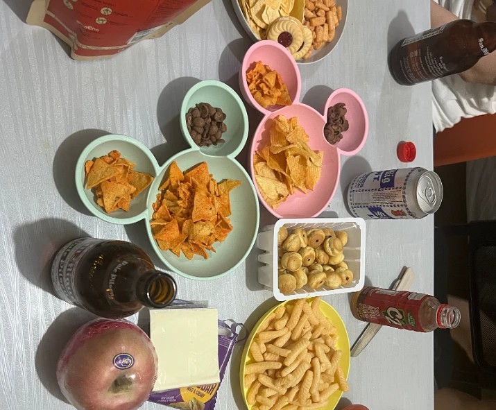 Snacks and drinks laid out on a table